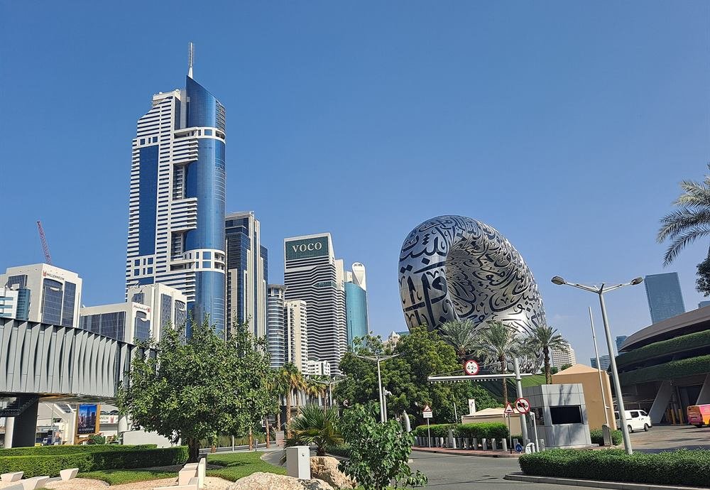 The Museum of the Future and modern towers under a clear Dubai sky